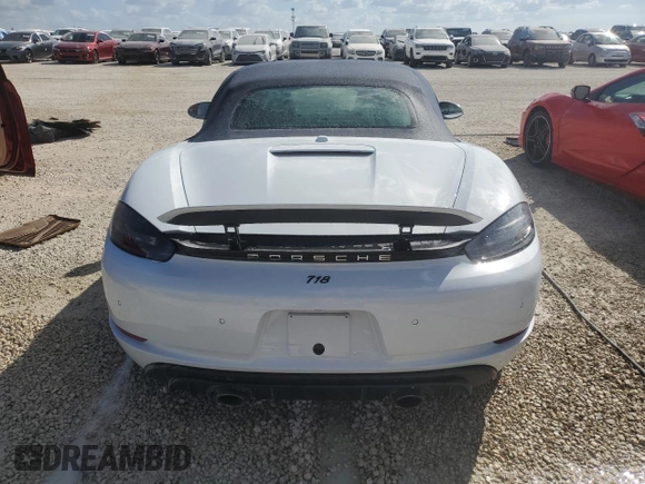 2022 Porsche 718 Boxster GTS 4.0 z VIN WP0CD2A85NS228315, wystawiony jako Copart lot #77248204 z przebiegiem Nie podano mil oraz Nie do naprawy. Historia ofert i sprzedaży dostępna na DreamBid. Obrazek 6.