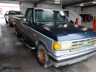 1989 Ford 1/2 Ton Trucks with VIN 1FTDF15N8KNA43274, listed as a IAAI auction lot 41384071 with 98,704 mi miles. Bid and sale history available at carsss.com. Image 1.