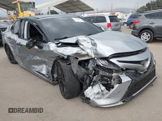 2021 Toyota Camry XSE with VIN 4T1KZ1AK6MU055986, listed as a IAAI auction lot 42410896 with 151,900 mi miles and . Bid and sale history available at DreamBid. Image 1.