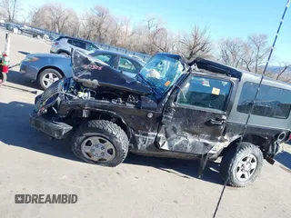 2013 Jeep Wrangler Sport with VIN 1C4AJWAG0DL645039, listed as a IAAI auction lot 41847808 with Not provided miles and . Bid and sale history available at DreamBid. Image 14.