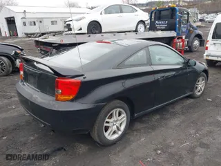 2001 Toyota Celica GT with VIN JTDDR32T510102122, listed as a IAAI auction lot 42027693 with 154,342 mi miles. Bid and sale history available at carsss.com. Image 4.