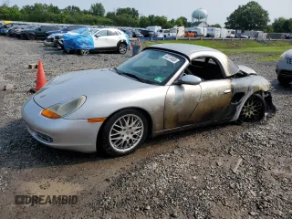 2002 Porsche Boxster with VIN WP0CA29802U622530, listed as a Copart auction lot 60275485 with Not provided miles and Salvage title. Bid and sale history available at DreamBid. Image 1.