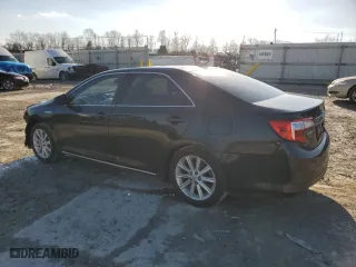 2012 Toyota Camry Hybrid XLE with VIN 4T1BD1FK6CU010696, listed as a Copart auction lot 44035955 with 124,790 mi miles and Salvage Title. Bid and sale history available at carsss.com. Image 2.