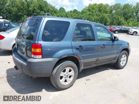 2006 Ford Escape XLT with VIN 1FMYU03156KA28848, listed as a IAAI auction lot 42670534 with 240,890 mi miles and . Bid and sale history available at DreamBid. Image 4.