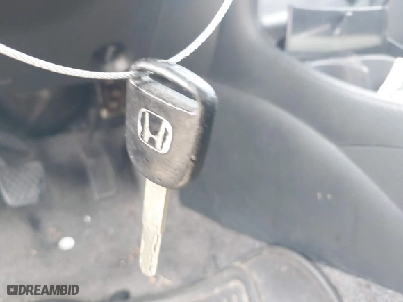 2005 Honda Civic LX with VIN 1HGEM21555L070407, listed as a IAAI auction lot 41997054 with 194,993 mi miles. Bid and sale history available at carsss.com. Image 11.