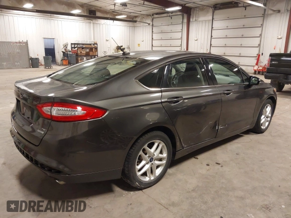 2016 Ford Fusion SE with VIN 1FA6P0HDXG5103054, listed as a IAAI auction lot 41823043 with 71,303 mi miles and . Bid and sale history available at DreamBid. Image 4.
