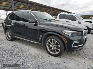 2019 BMW X5 xDrive40i with VIN 5UXCR6C51KLK86938, listed as a Copart auction lot 49463825 with 133,001 mi miles and Clean Title. Bid and sale history available at carsss.com. Image 4.