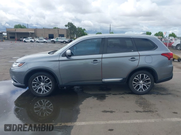 2018 Mitsubishi Outlander SE with VIN JA4AD3A31JZ016055, listed as a IAAI auction lot 42245714 with 97,448 mi miles and . Bid and sale history available at DreamBid. Image 14.