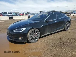 2014 Tesla Model S P85D with VIN 5YJSA1H28EFP63765, listed as a Copart auction lot 50241385 with 100,274 mi miles and Salvage Title. Bid and sale history available at DreamBid. Image 1.