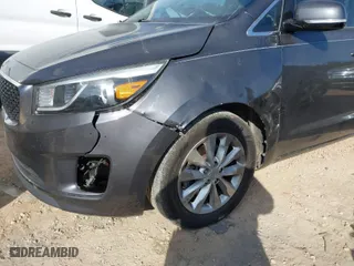 2016 Kia Sedona EX with VIN KNDMC5C10G6137795, listed as a IAAI auction lot 41015257 with 114,347 mi miles. Bid and sale history available at carsss.com. Image 2.
