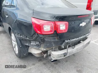 2013 Chevrolet Malibu LTZ with VIN 1G11H5SA2DU125573, listed as a IAAI auction lot 42047422 with 165,493 mi miles and . Bid and sale history available at DreamBid. Image 6.