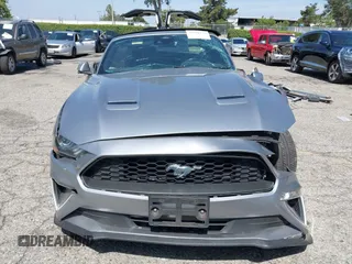 2021 Ford Mustang EcoBoost z VIN 1FATP8UH2M5120162, wystawiony jako IAAI lot #42561125 z przebiegiem 55 360 mil mil oraz . Historia ofert i sprzedaży dostępna na DreamBid. Obrazek 13.