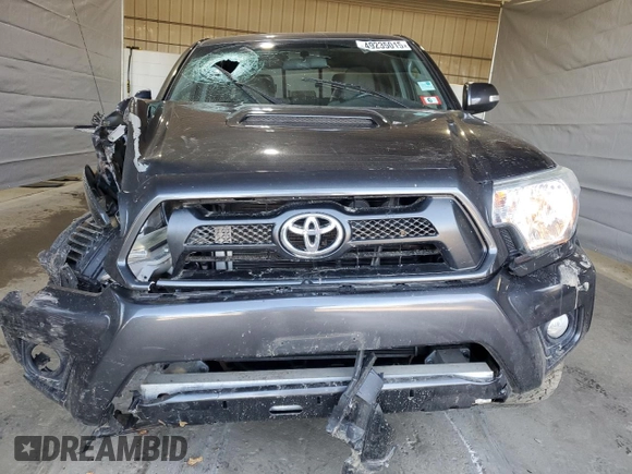 2014 Toyota Tacoma z VIN 3TMMU4FN4EM071741, wystawiony jako Copart lot #49235015 z przebiegiem 60 825 mil mil oraz Szkoda całkowita • Salvage title. Historia ofert i sprzedaży dostępna na DreamBid. Obrazek 5.