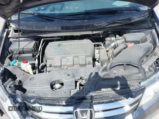 2014 Honda Odyssey Touring with VIN 5FNRL5H91EB093540, listed as a IAAI auction lot 41887412 with 202,076 mi miles and . Bid and sale history available at DreamBid. Image 10.