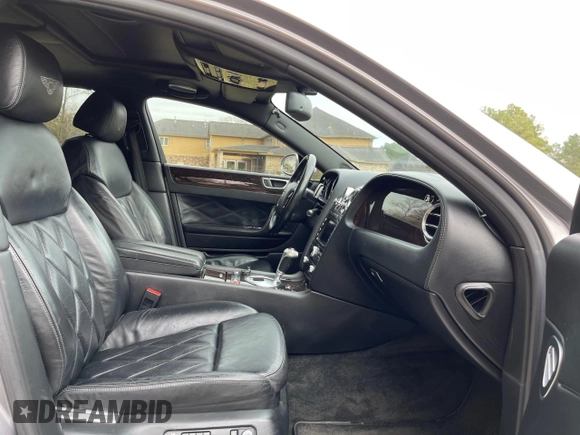 2007 Bentley Flying Spur z VIN SCBBR93W178041237, wystawiony jako Copart lot #82493784 z przebiegiem 122 543 mil mil oraz Czysty tytuł • Clean title. Historia ofert i sprzedaży dostępna na DreamBid. Obrazek 5.
