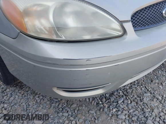 2005 Ford Taurus SE with VIN 1FAFP53205A131307, listed as a IAAI auction lot 42678385 with 198,491 mi miles and . Bid and sale history available at DreamBid. Image 6.