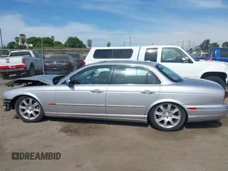 2004 Jaguar XJ 8 with VIN SAJEA71C74SG11470, listed as a IAAI auction lot 42032116 with 209,821 mi miles and . Bid and sale history available at DreamBid. Image 15.