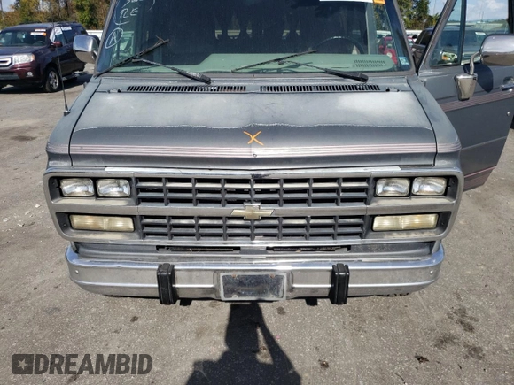 1994 Chevrolet Chevy Van с VIN 1GBEG25K5RF123489, выставлен на аукционе Copart как лот 79491854 с пробегом 82 970 миль миль и Списание • Salvage title. История ставок и продаж доступна на DreamBid. Изображение 12.