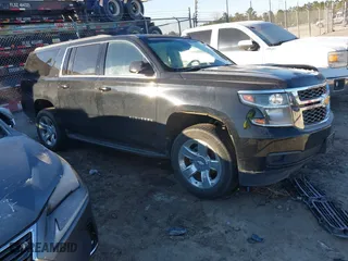 2019 Chevrolet Suburban LT with VIN 1GNSKHKC7KR163906, listed as a IAAI auction lot 41258691 with 112,207 mi miles. Bid and sale history available at carsss.com. Image 1.