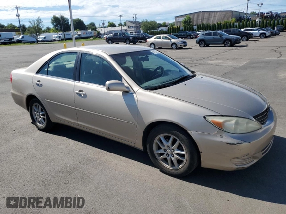 2004 Toyota Camry LE with VIN 4T1BE32K84U929163, listed as a Copart auction lot 65193485 with 245,734 mi miles and Clean title. Bid and sale history available at DreamBid. Image 4.