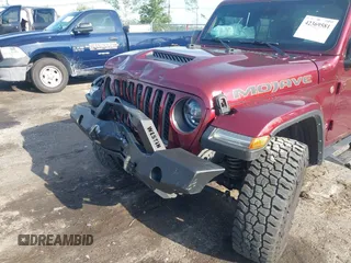 2021 Jeep Gladiator Mojave with VIN 1C6JJTEG8ML592381, listed as a IAAI auction lot 42369581 with 75,295 mi miles and . Bid and sale history available at DreamBid. Image 6.