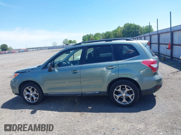 2016 Subaru Forester Touring with VIN JF2SJAVCXGH490507, listed as a IAAI auction lot 42070715 with 98,456 mi miles and . Bid and sale history available at DreamBid. Image 14.