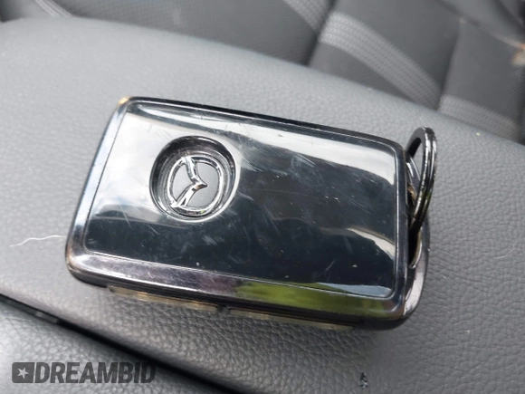 2024 Mazda CX-50 S Premium with VIN 7MMVABDM0RN185128, listed as a IAAI auction lot 42383177 with 21,267 mi miles and . Bid and sale history available at DreamBid. Image 11.