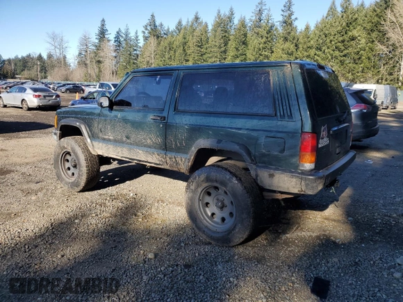1999 Jeep Cherokee SE with VIN 1J4FF27S9XL667941, listed as a Copart auction lot 42429785 with 121,490 mi miles and Salvage title. Bid and sale history available at DreamBid. Image 2.
