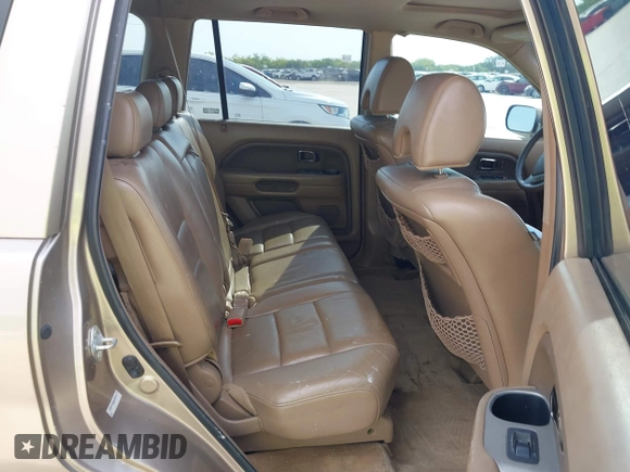 2006 Honda Pilot EX-L with VIN 5FNYF18586B028291, listed as a IAAI auction lot 42040904 with 217,038 mi miles and . Bid and sale history available at carsss.com. Image 8.
