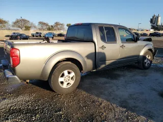 2007 Nissan Frontier SE z VIN 1N6AD09U47C427847, wystawiony jako Copart lot #45596155 z przebiegiem 170 980 mil mil oraz Szkoda całkowita • Salvage title. Historia ofert i sprzedaży dostępna na DreamBid. Obrazek 3.