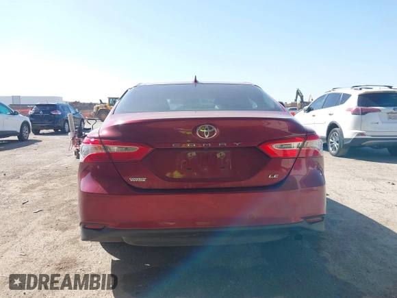 2019 Toyota Camry LE with VIN 4T1B11HK4KU725075, listed as a IAAI auction lot 41781275 with 156,856 mi miles and . Bid and sale history available at DreamBid. Image 16.