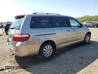 2006 Honda Odyssey EX-L z VIN 5FNRL38726B425098, wystawiony jako Copart lot #56143585 z przebiegiem 153 137 mil mil oraz Szkoda całkowita • Salvage title. Historia ofert i sprzedaży dostępna na DreamBid. Obrazek 3.