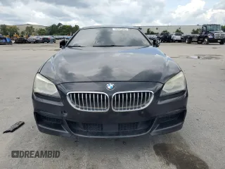 2015 BMW 6 Series 650i z VIN WBA6B2C5XFD130082, wystawiony jako Copart lot #58449885 z przebiegiem Nie podano mil oraz Czysty tytuł • Clean title. Historia ofert i sprzedaży dostępna na DreamBid. Obrazek 5.