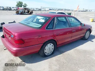 1995 Ford Taurus GL with VIN 1FALP52U8SA195242, listed as a IAAI auction lot 42634281 with 162,168 mi miles and . Bid and sale history available at DreamBid. Image 4.