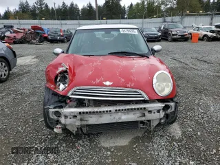 2004 MINI Hardtop with VIN WMWRC33464TJ54261, listed as a Copart auction lot 55150205 with 212,636 mi miles and Salvage Title. Bid and sale history available at DreamBid. Image 11.