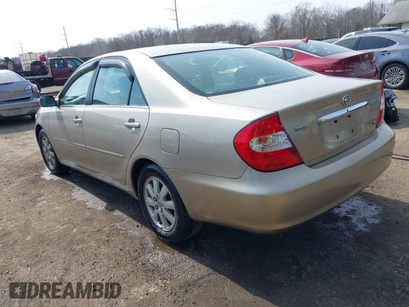 2004 Toyota Camry LE with VIN 4T1BF30K94U587836, listed as a IAAI auction lot 41714277 with 211,893 mi miles and . Bid and sale history available at carsss.com. Image 3.