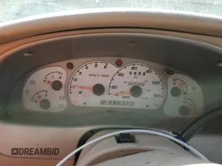 2002 Ford Explorer Sport Value z VIN 1FMYU60E62UB91081, wystawiony jako Copart lot #75688824 z przebiegiem 229 382 mil mil oraz Szkody całkowita. Historia ofert i sprzedaży dostępna na DreamBid. Obrazek 9.