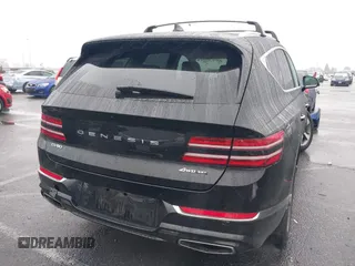 2022 Genesis GV80 Advanced Plus with VIN KMUHCESCXNU078815, listed as a IAAI auction lot 41558532 with 35,424 mi miles and . Bid and sale history available at DreamBid. Image 4.
