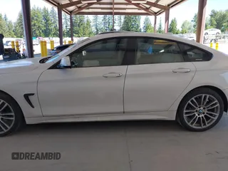 2015 BMW 4 Series 428i xDrive z VIN WBA4A7C55FD413965, wystawiony jako IAAI lot #42368615 z przebiegiem 108 308 mil mil oraz . Historia ofert i sprzedaży dostępna na DreamBid. Obrazek 14.