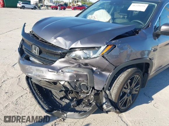 2022 Honda Pilot Special Edition with VIN 5FNYF5H25NB035016, listed as a IAAI auction lot 41248194 with 30,039 mi miles and . Bid and sale history available at DreamBid. Image 18.