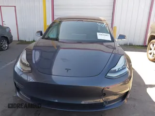 2018 Tesla Model 3 Long Range Battery with VIN 5YJ3E1EA7JF163401, listed as a IAAI auction lot 41829681 with 90,065 mi miles. Bid and sale history available at carsss.com. Image 11.