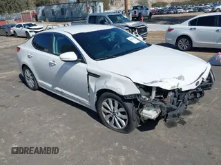 2015 Kia Optima LX with VIN KNAGM4A72F5616233, listed as a IAAI auction lot 41824232 with 163,006 mi miles. Bid and sale history available at carsss.com. Image 1.