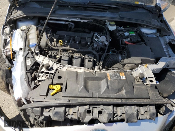 2018 Ford Focus SE with VIN 1FADP3F25JL324753, listed as a Copart auction lot 58624995 with 129,127 mi miles and Salvage title. Bid and sale history available at DreamBid. Image 11.
