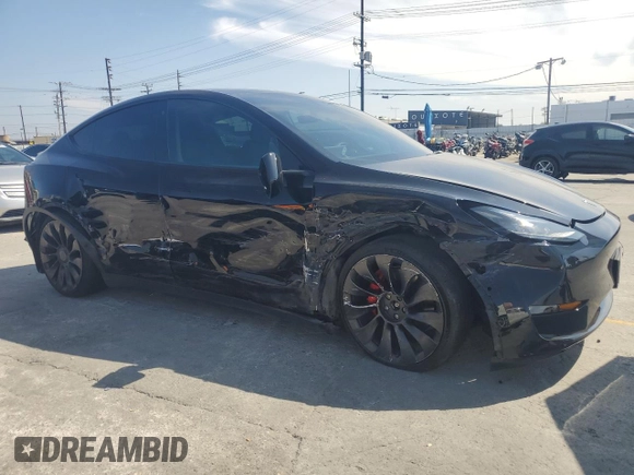 2022 Tesla Model Y Performance with VIN 7SAYGDEF6NF524171, listed as a Copart auction lot 60736945 with 30,629 mi miles and Salvage title. Bid and sale history available at DreamBid. Image 4.