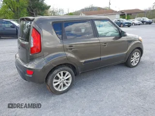 2012 Kia Soul + with VIN KNDJT2A63C7355735, listed as a IAAI auction lot 42041895 with 182,296 mi miles. Bid and sale history available at carsss.com. Image 4.