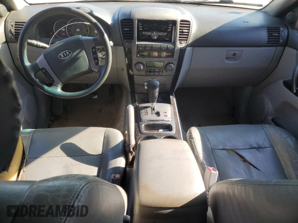 2007 Kia Sorento LX z VIN KNDJD736275669305, wystawiony jako Copart lot #85305954 z przebiegiem 217 513 mil mil oraz Szkoda całkowita • Salvage title. Historia ofert i sprzedaży dostępna na DreamBid. Obrazek 8.