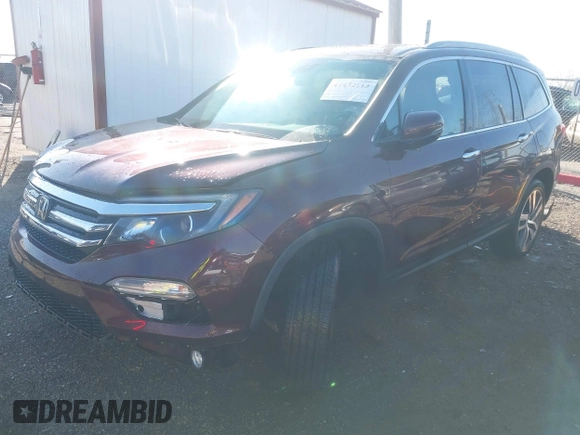 2016 Honda Pilot Touring with VIN 5FNYF6H90GB126572, listed as a IAAI auction lot 41872113 with 94,318 mi miles. Bid and sale history available at carsss.com. Image 17.