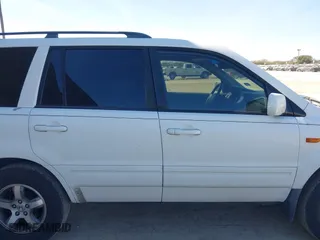 2006 Honda Pilot EX-L with RES with VIN 5FNYF28606B030602, listed as a IAAI auction lot 41392868 with 227,782 mi miles. Bid and sale history available at carsss.com. Image 13.