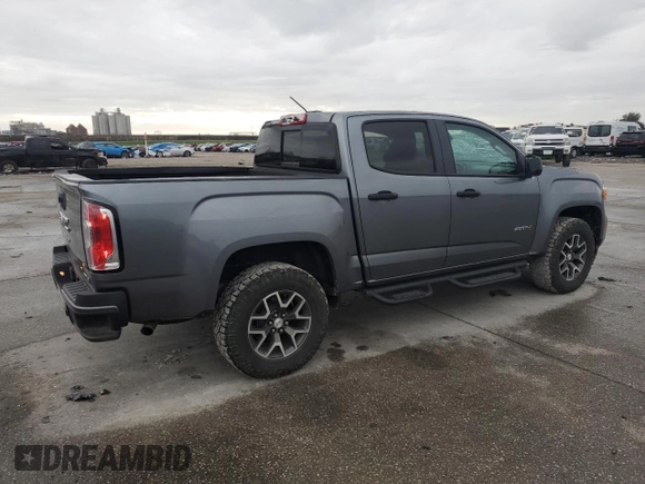 2021 GMC Canyon 4WD AT4 w/Leather with VIN 1GTG6FEN4M1116175, listed as a Copart auction lot 83679894 with 33,646 mi miles and Salvage Title. Bid and sale history available at carsss.com. Image 3.