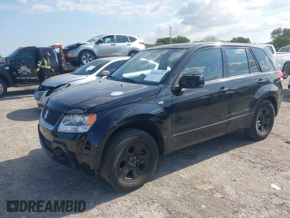 2008 Suzuki Grand Vitara with VIN JS3TE941284102380, listed as a IAAI auction lot 42061609 with 103,554 mi miles and . Bid and sale history available at DreamBid. Image 17.